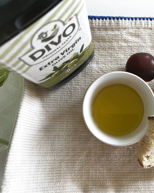DIVO bottle with olive oil and bread