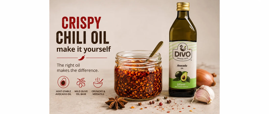 Homemade crispy chili oil in a jar beside DIVO avocado oil and spices.